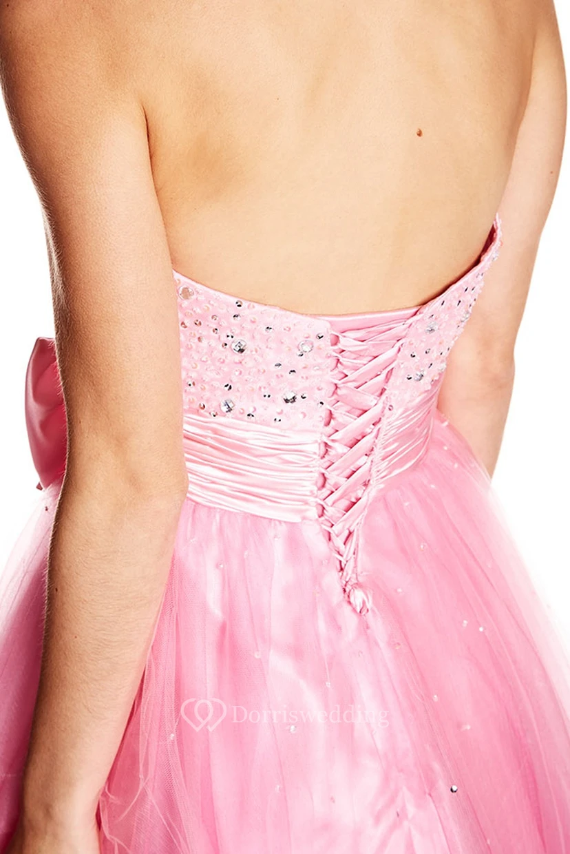 Vestido de fiesta largo de tul y satén sin mangas con lentejuelas, escote corazón y corte en A, con lazo. view 4