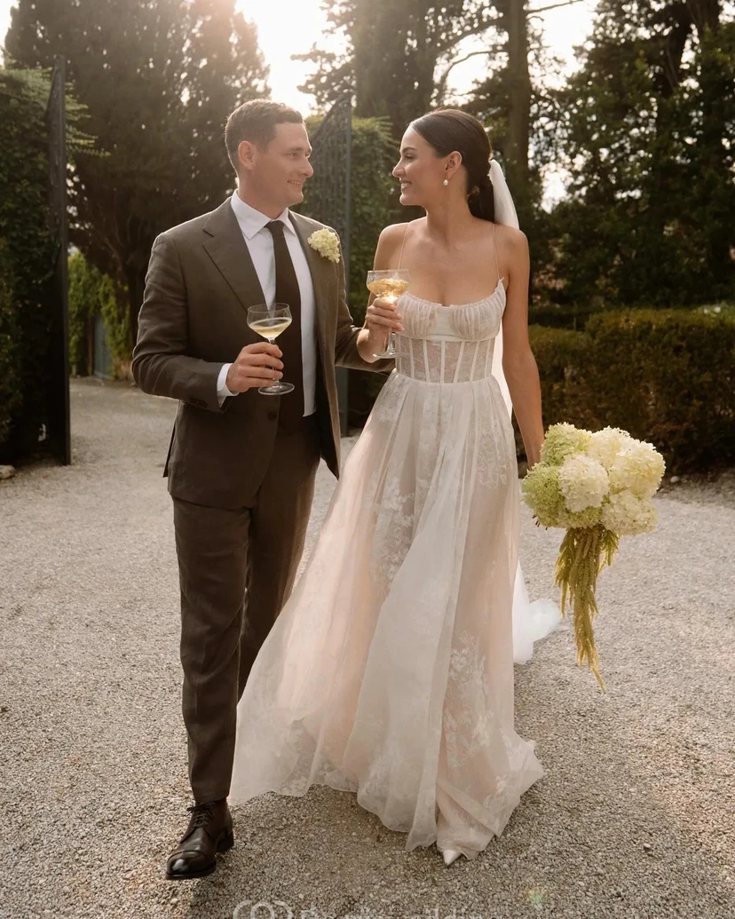 Modern Corset-Style A-Line Wedding Dress with Lace Overlay