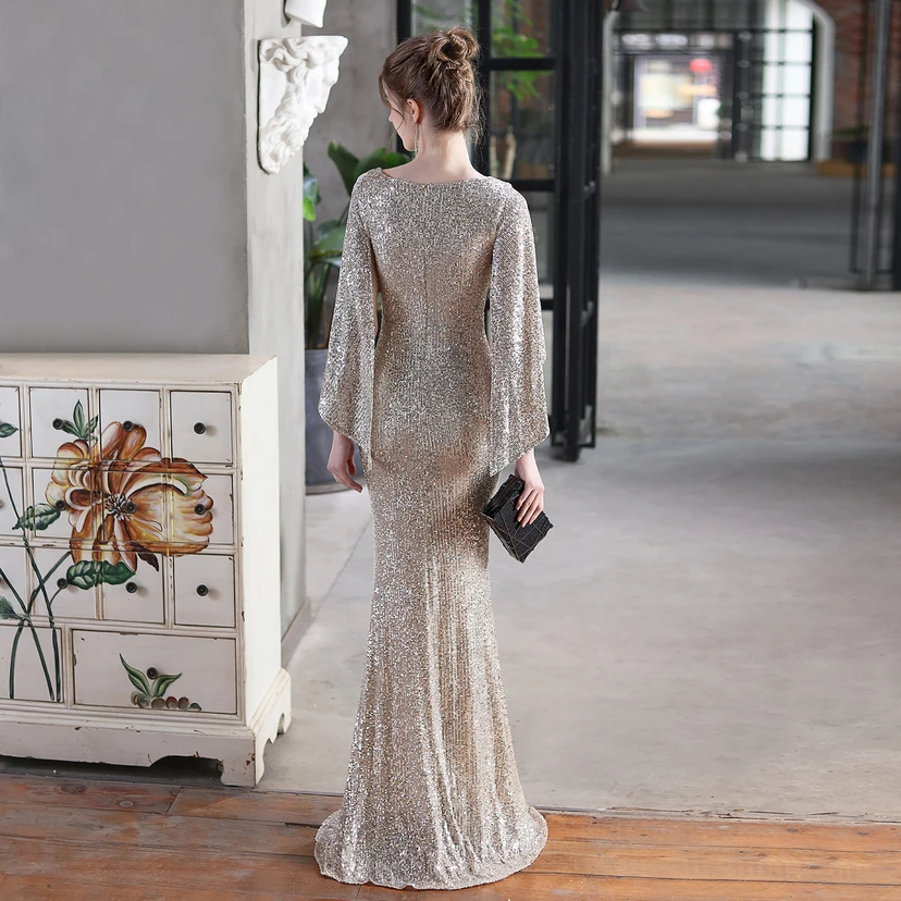 Robe de soirée élégante à paillettes, style sirène, ailes d'ange, idéale pour un banquet ou une réunion. Mannequin automobile. Robe de soirée d'été. view 40