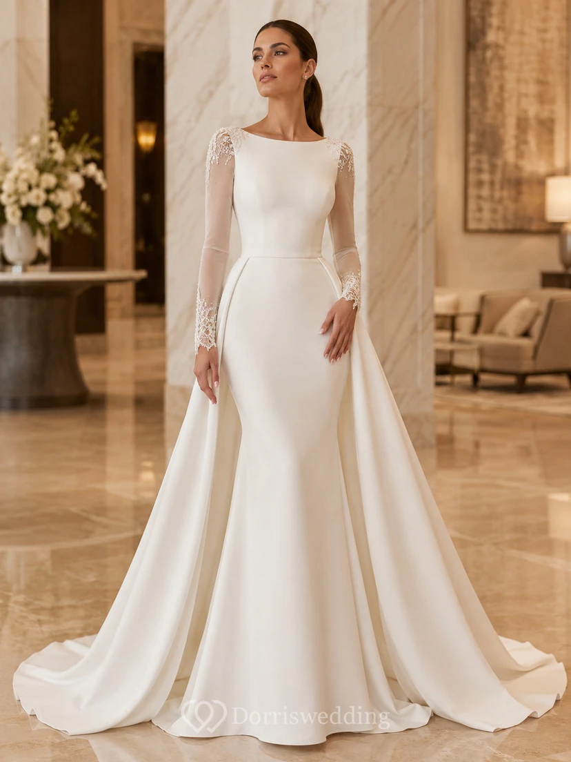 Elegante vestido de novia de corte A, largo capilla, escote redondo, mangas largas ilusión y estilo satén.