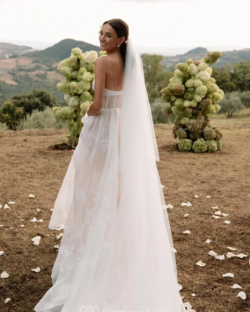 Modern Corset-Style A-Line Wedding Dress with Lace Overlay view 2