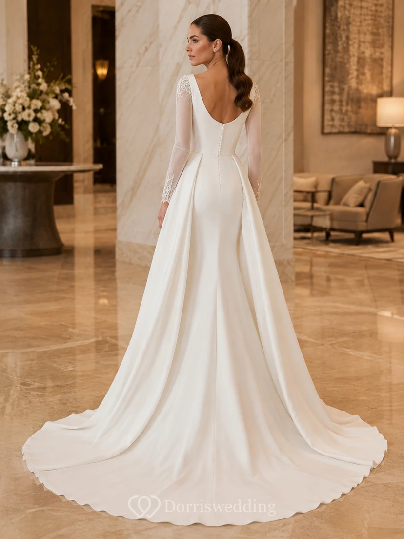 Elegante vestido de novia de corte A, largo capilla, escote redondo, mangas largas ilusión y estilo satén. view 2