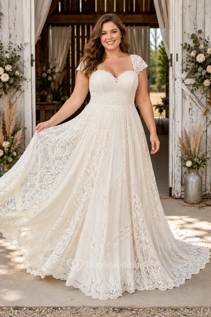 Vestido de novia de talla grande con mangas cortas, encaje y corte en A, con falda de apliques completos.