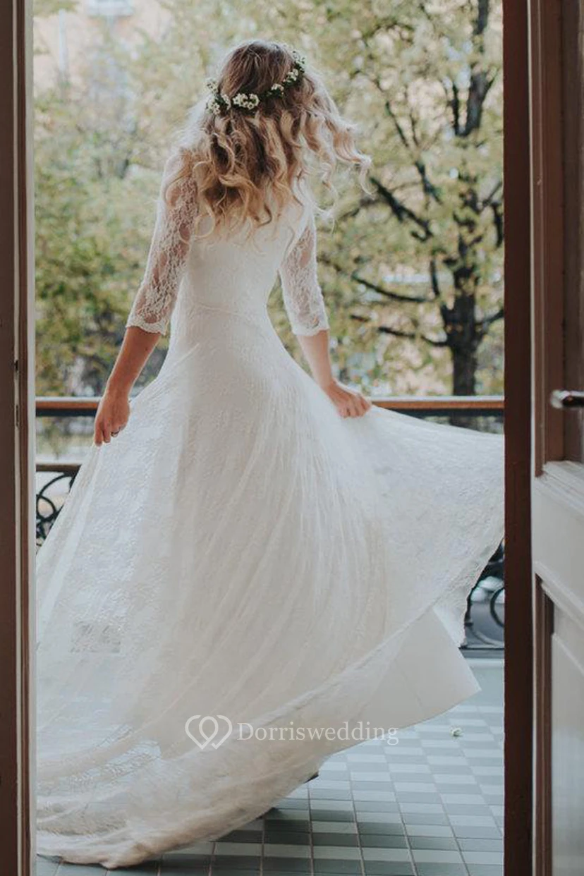 Vestido de novia de gasa, jersey, satén, fajín, cinta y encaje view 2