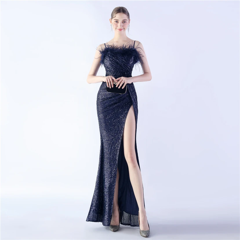 Vestido de noche de alta gama para bodas, con flores y detalles de plumas de avestruz. view 59