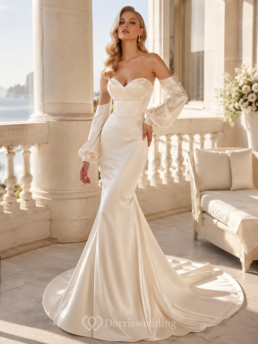 Robe de mariée sirène minimaliste en satin poli, décolleté cœur, manches gigot amovibles et traîne chapelle