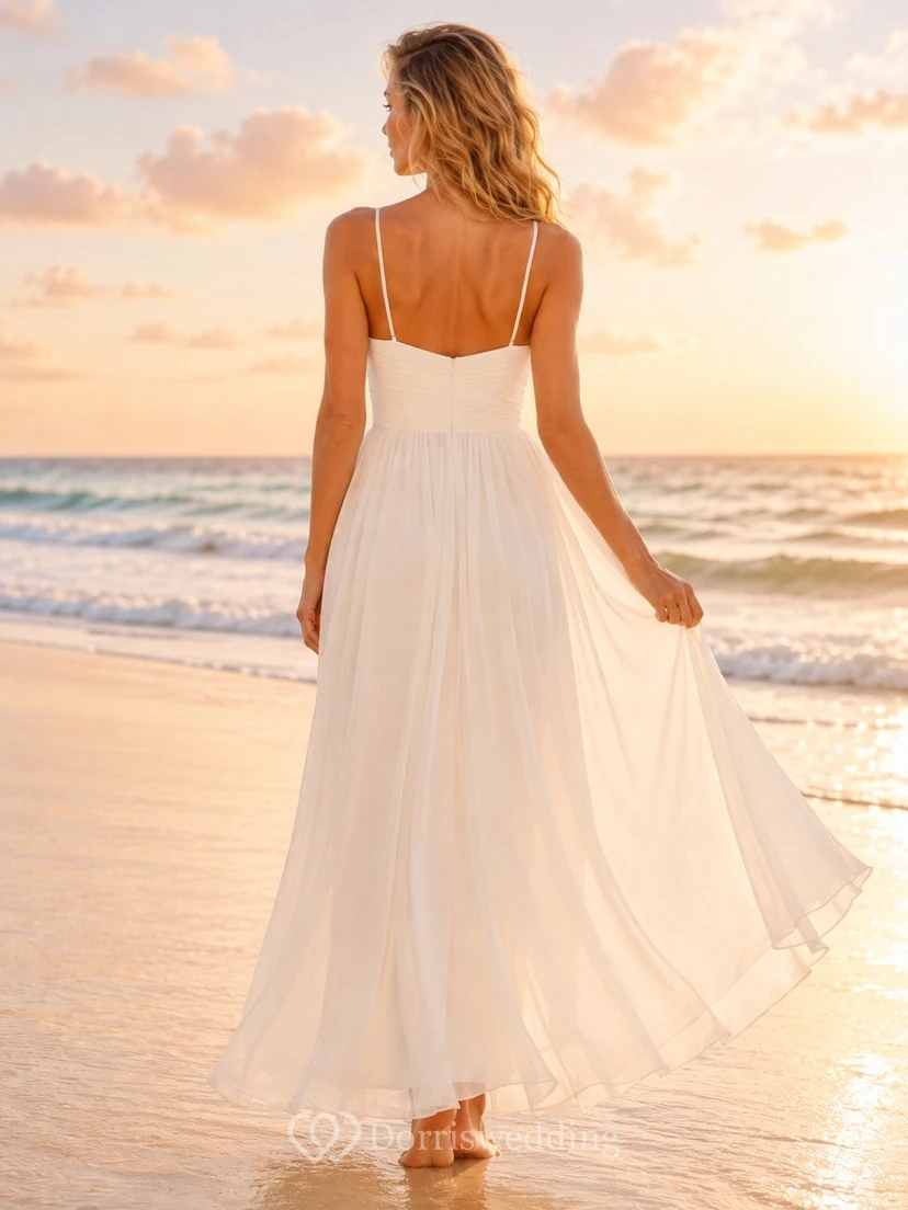 Robe de plage bohème en mousseline ivoire, bustier cœur, bretelles, sans manches, fente sur le devant, coupe trapèze, longue jusqu'au sol view 2