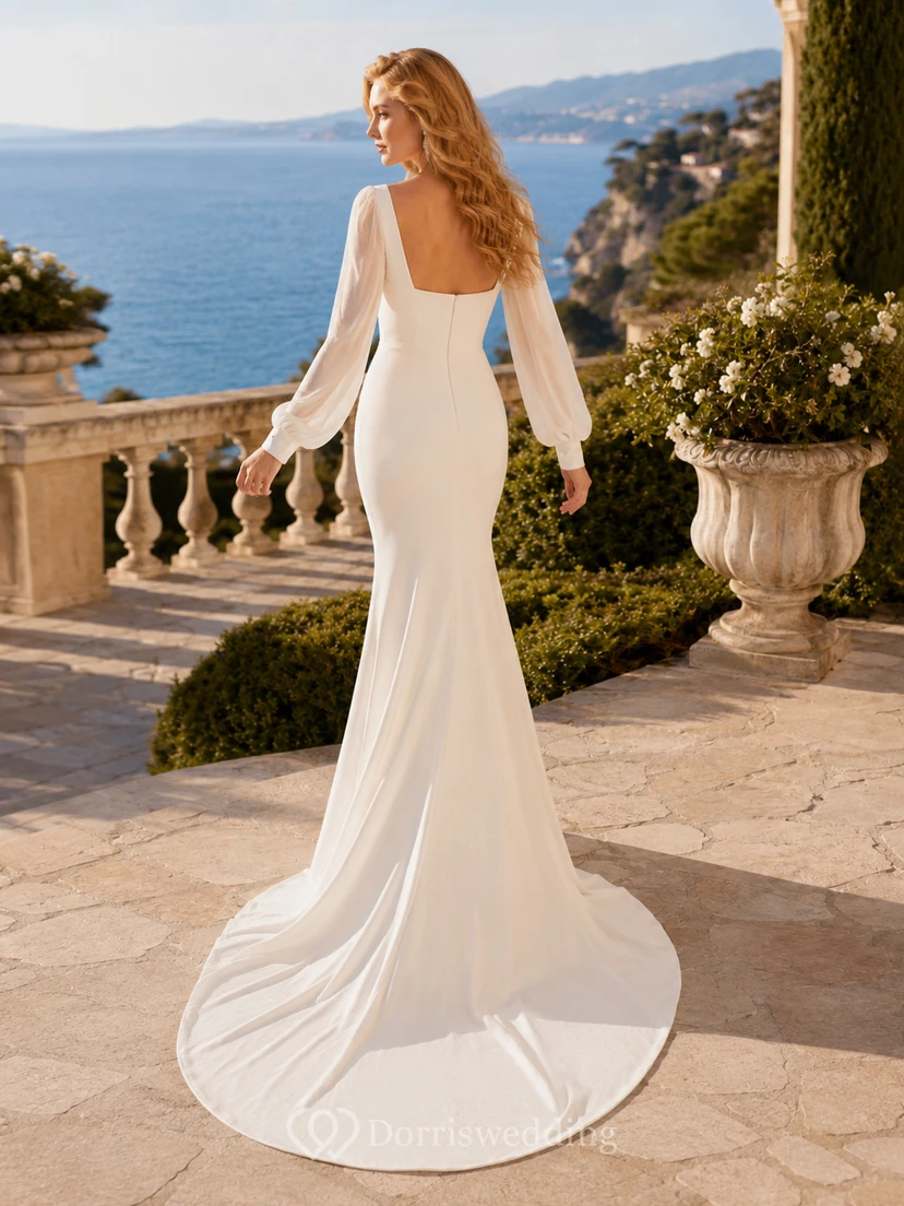 Robe de mariée sirène moderne en crêpe à col carré et manches bouffantes longues, idéale pour une destination romantique view 2