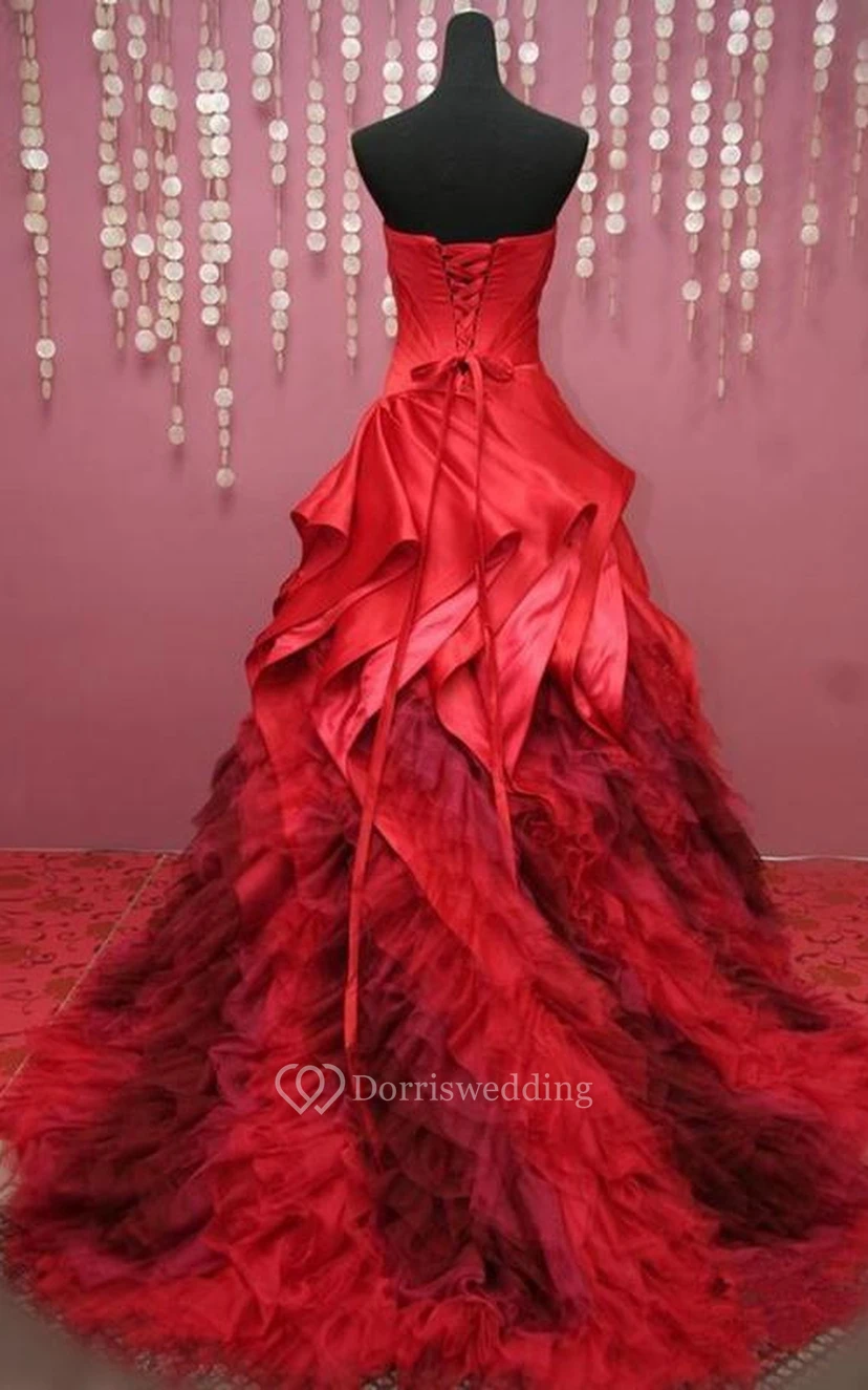 Vestido largo de gala con escote corazón, sin mangas, pliegues acampanados, cola de corte recto y espalda con cordones, de tul y encaje. view 2