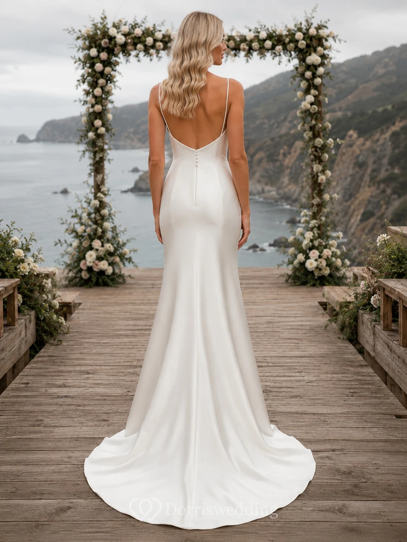 Robe de mariée fourreau en satin à bretelles spaghetti et col châle, idéale pour un mariage de destination en bord de falaise view 2