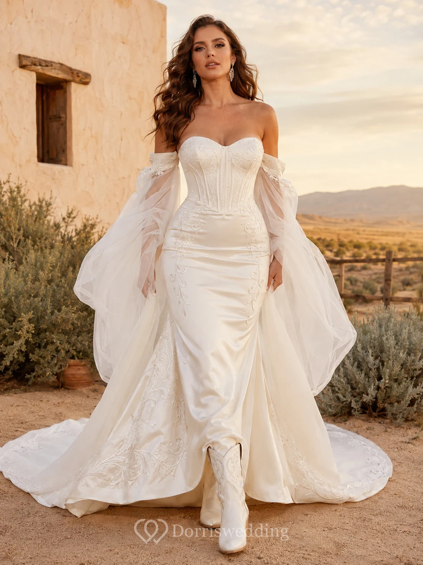 Robe de mariée sirène en satin à épaules dénudées, style western, avec traîne chapelle spectaculaire en tulle et tulle.
