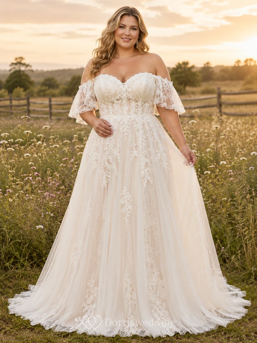 Vestido de novia de encaje y tul, corte en A, hombros descubiertos, manga corta, cola larga y apliques.