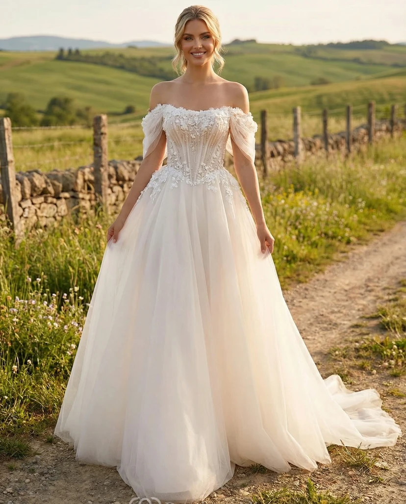 Schulterfreies Brautkleid aus Spitze mit Korsett-Oberteil