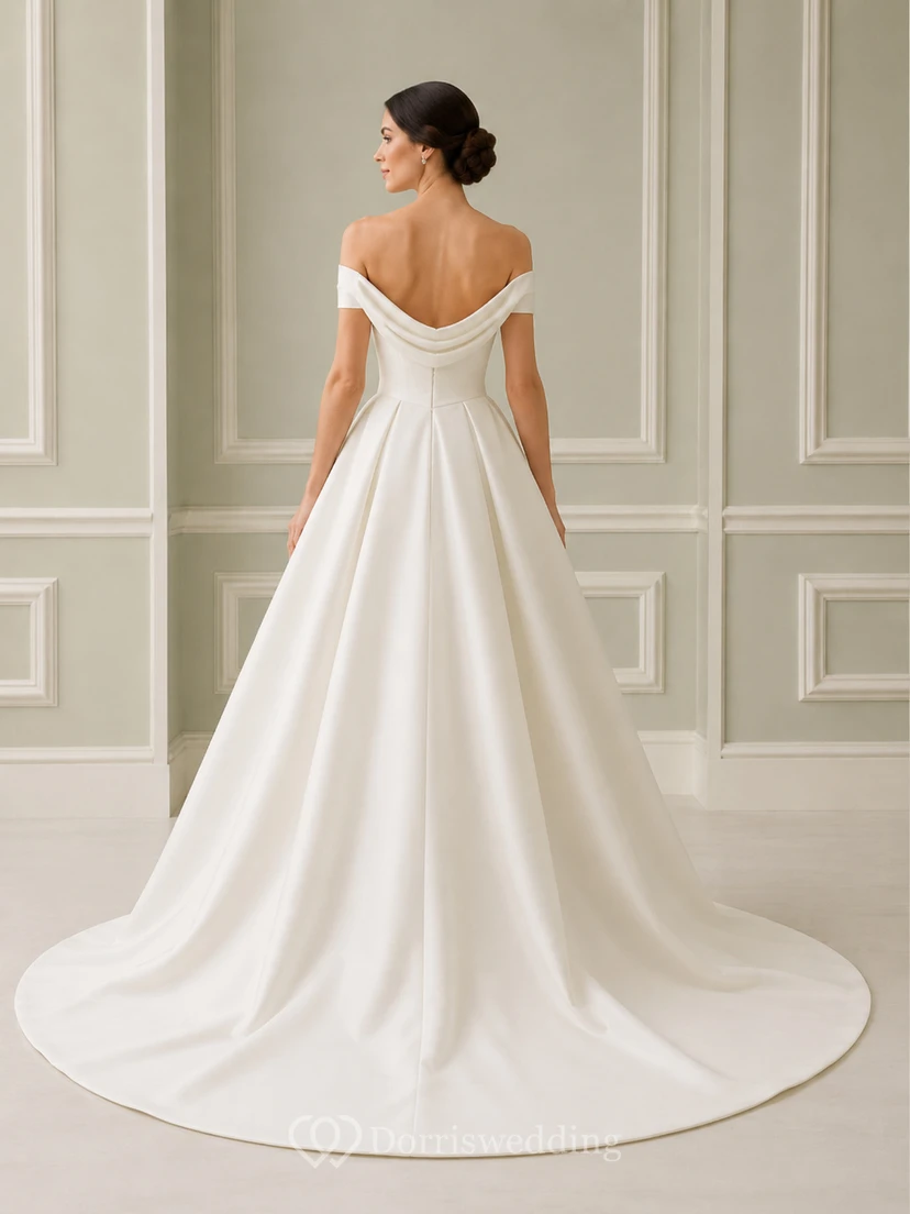 Elegant off shoulder satin bridal ball gown with pleated skirt view 2