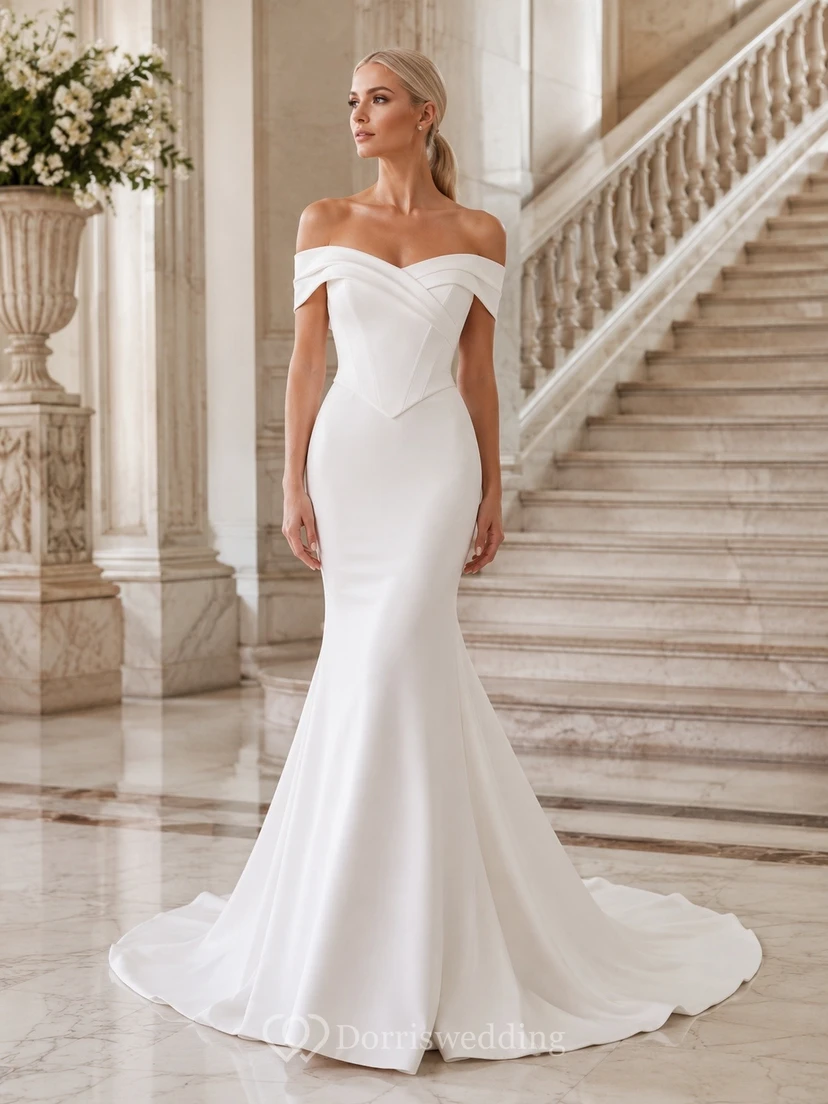 Vestido de novia sencillo estilo sirena con escote Bardot, cintura baja y cola.