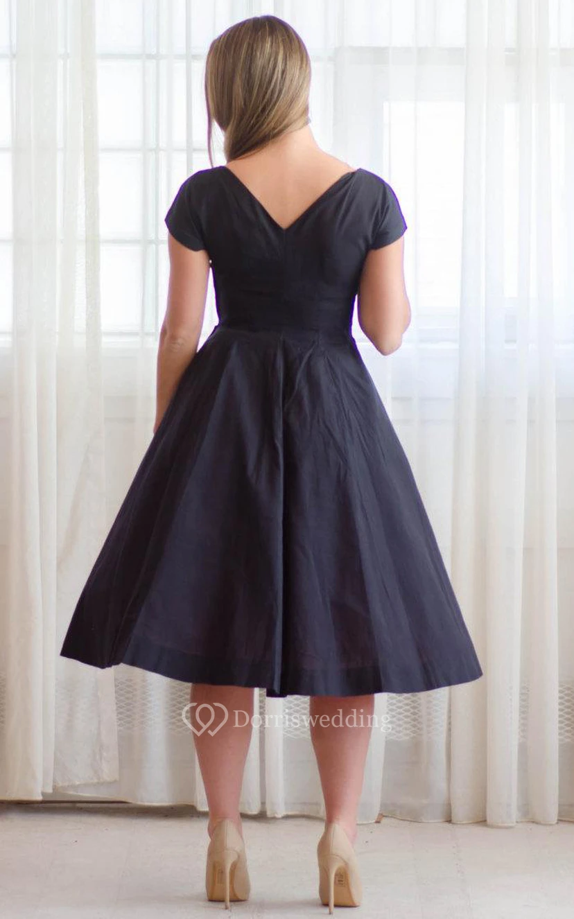 Robe décontractée à col en V, longueur thé et manches courtes view 2