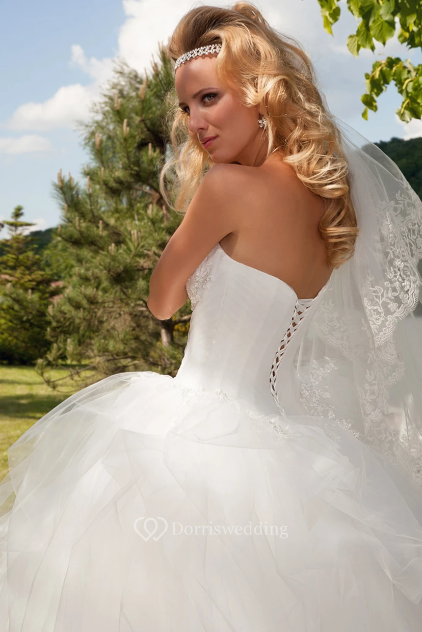 Long Sweetheart Beaded Ruffled Tulle Wedding Dress With Court Train And Corset Back view 3