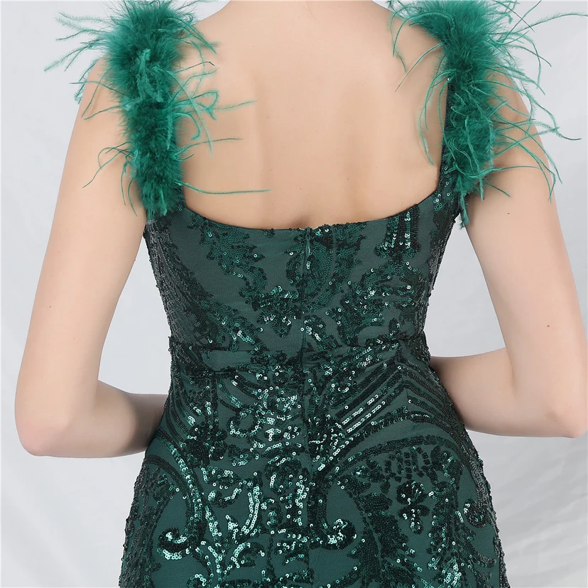 Robe longue haut de gamme en maille à sequins et plumes d'autruche. view 34