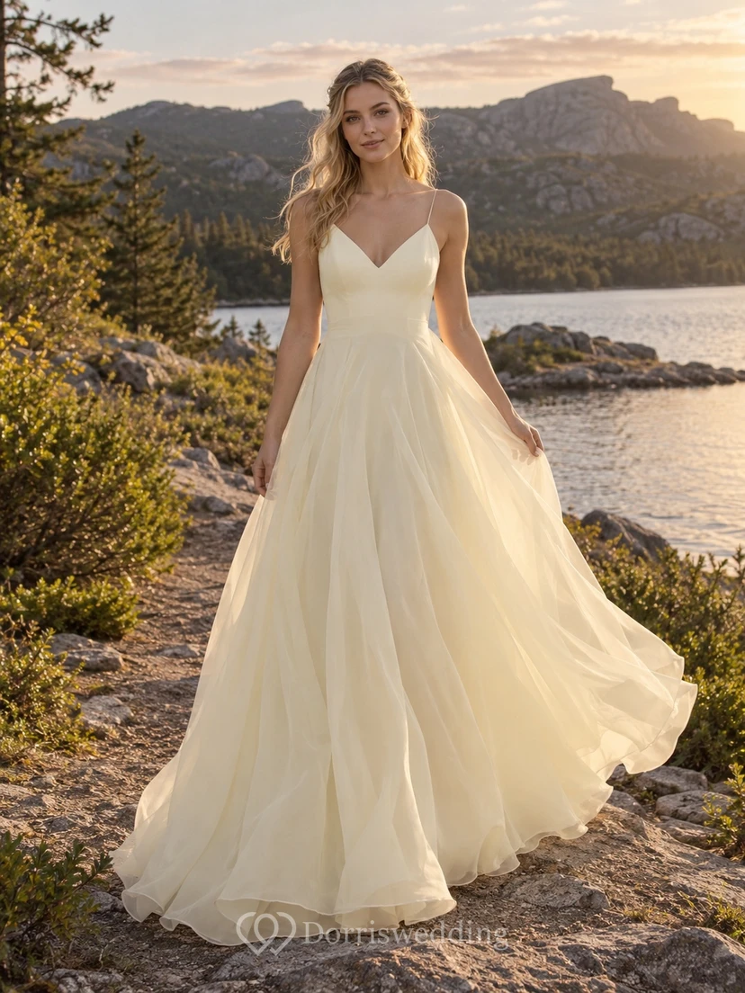 Brautkleid aus buttergelbem Organza mit V-Ausschnitt, Spaghettiträgern und Schleppe