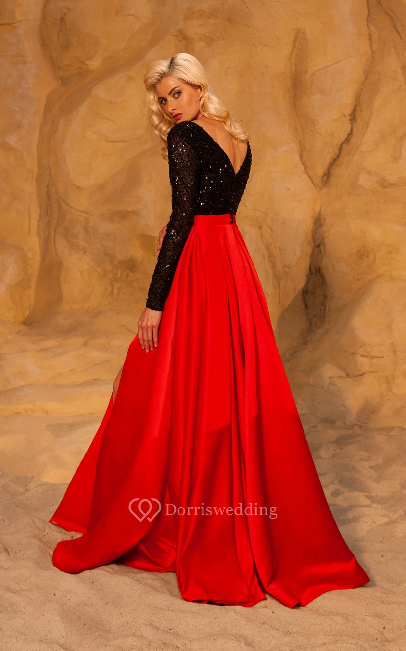 Robe de bal noire et rouge fendue sur le devant, manches longues, décolleté plongeant et effet illusion, haut orné de perles view 2