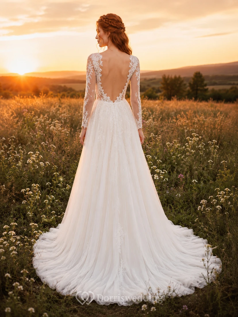 Vestido de novia bohemio de tul con espalda descubierta y mangas largas, estampado de atardecer. view 2