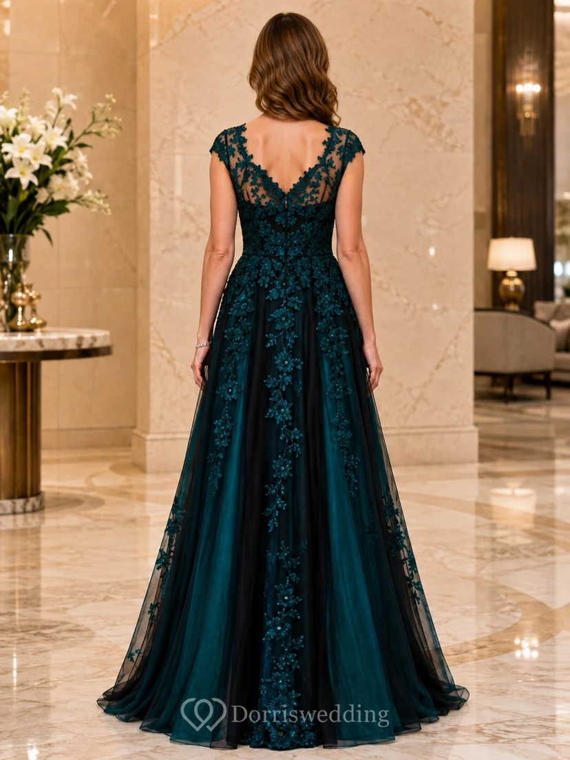 Robe de soirée longue en dentelle florale noire et turquoise, col en V, manches courtes, coupe trapèze. view 2