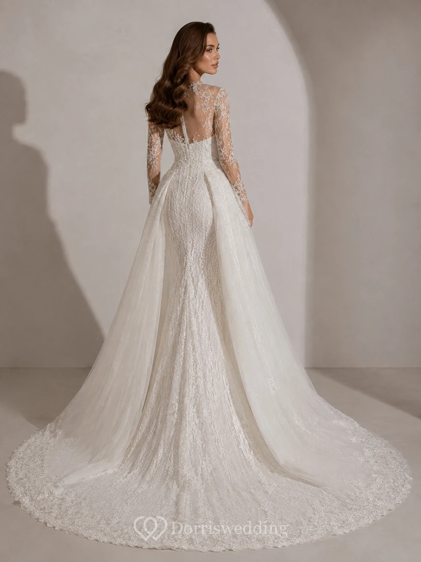 Robe de mariée cape en satin et dentelle botanique, col montant, manches longues et traîne cathédrale, style illusion, pour une destination de mariage. view 2