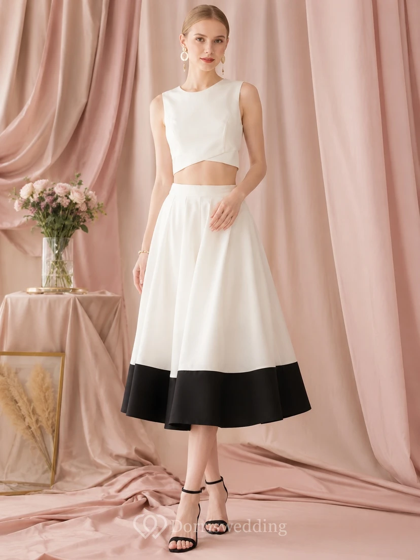 Vestido formal moderno de dos piezas en blanco y negro, sin mangas, de satén, largo hasta la rodilla, para invitadas.