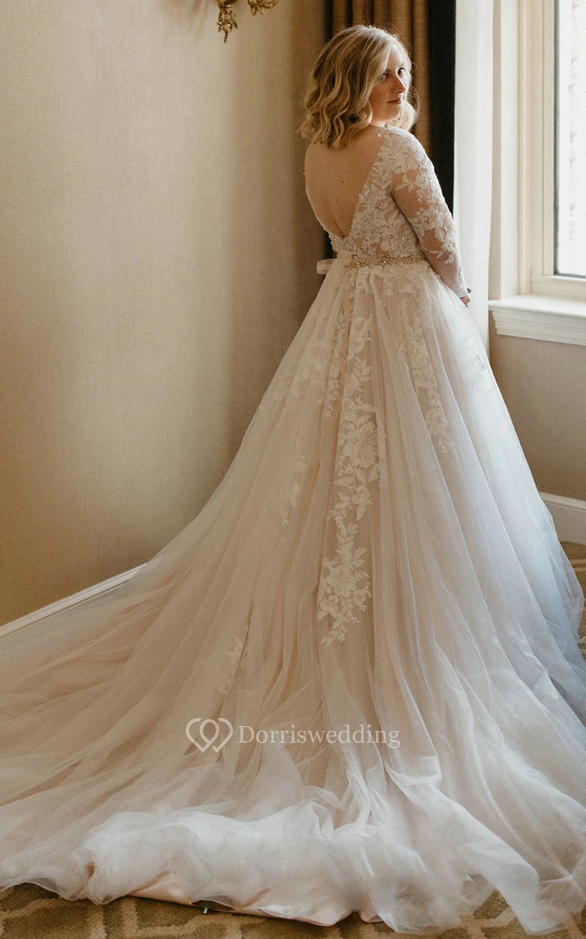 Elegant A Line Lace Brush Train Long Sleeve Backless Wedding Dress with Appliques view 2