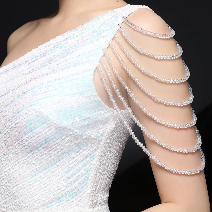 Robe de soirée longue et moulante à sequins colorés, confectionnée avec soin, idéale pour une célébrité ou une fête. Robe de mariée sexy et cintrée, confectionnée avec des paillettes colorées et lourdes. Robe de mariée longue et moulante, parfaite pour une occasion spéciale. view 28