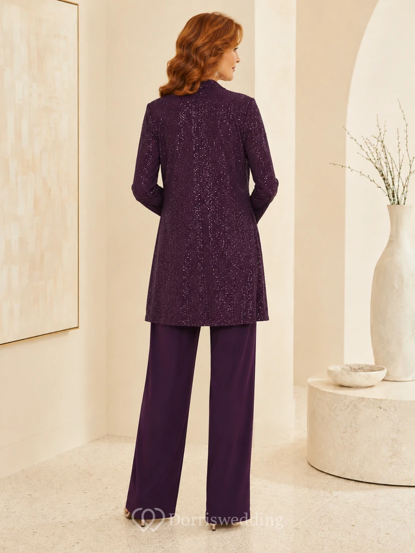 Plum Mother Jumpsuit mit langem, verziertem Jäckchen mit eckigem Ausschnitt und weitem Bein sowie einer langen, verzierten Jacke und einer Hose mit eckigem Ausschnitt. view 2