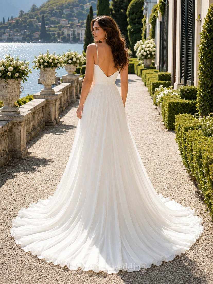 Robe de mariée romantique en mousseline à fines bretelles et décolleté en V, coupe trapèze, traîne chapelle, style A, en mousseline, style A, pour un mariage à destination view 2