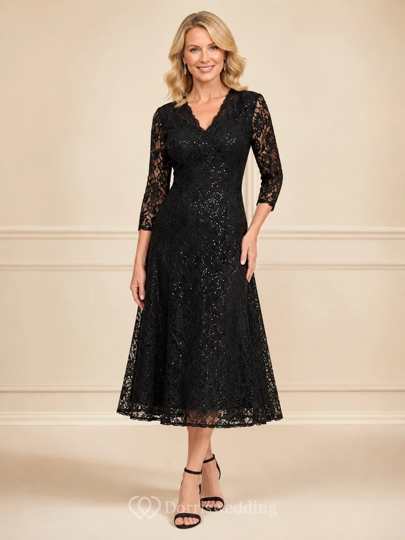 Vestido negro de corte A, encaje, escote en V, manga tres cuartos, largo midi, elegante y formal.