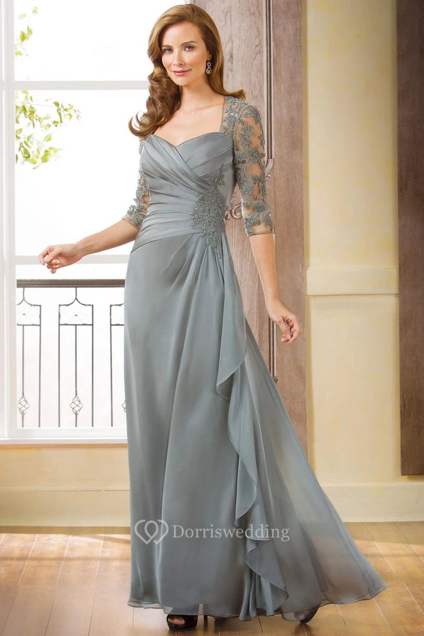 Langes Kleid mit 3-4 Ärmeln, Rüschen und Applikationen