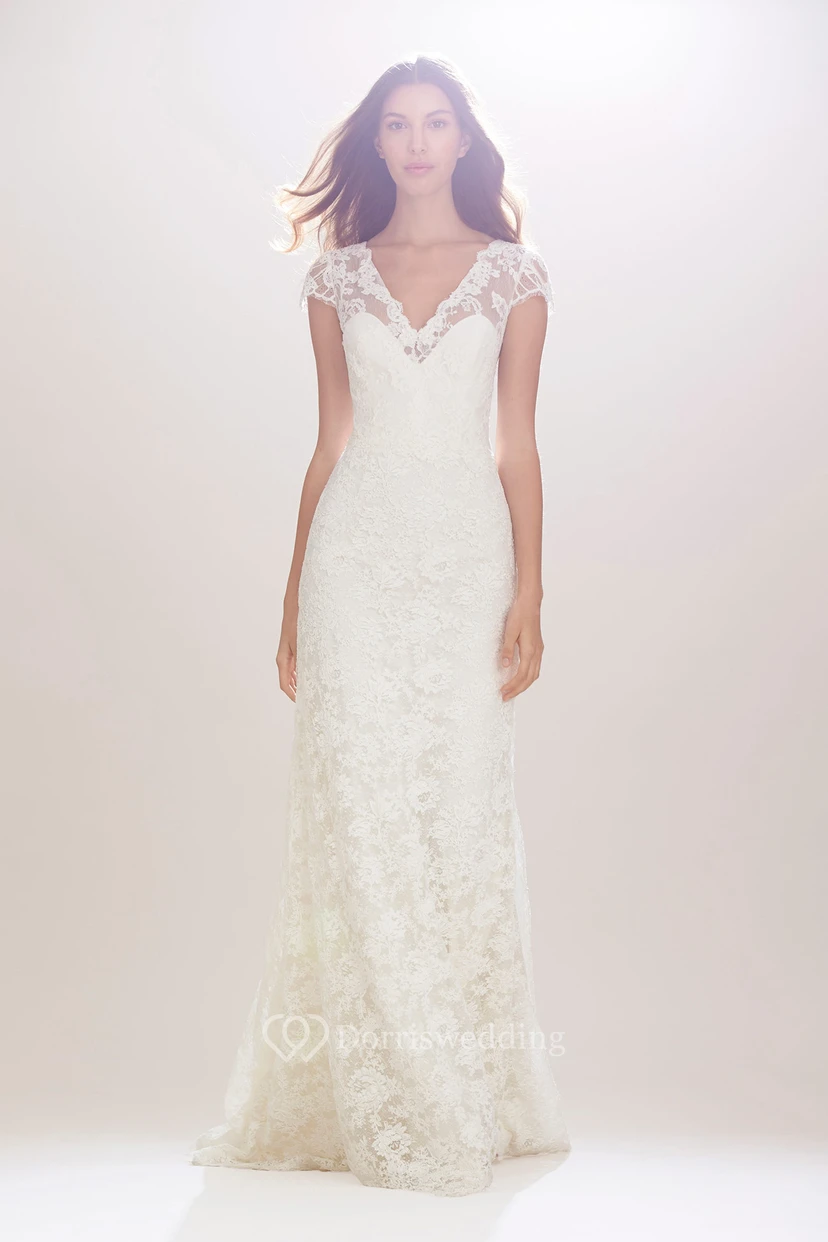 Vestido de novia largo de encaje con apliques, escote en V, mangas cortas, cinta y efecto ilusión. view 3