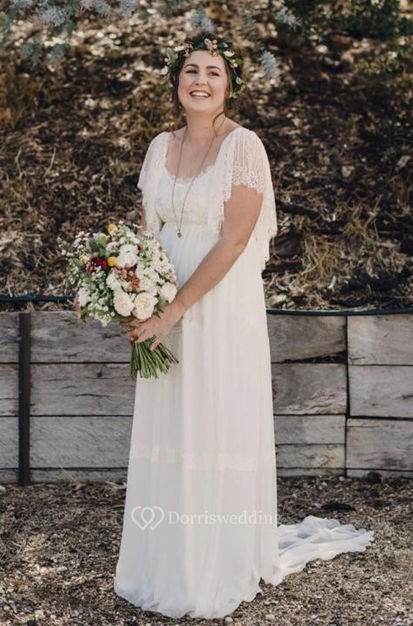 Vestido de novia bohemio de talla grande con encaje, mangas cortas y escote redondo en la espalda.