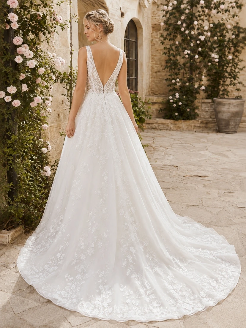 Vestido de novia de corte A con encaje y cintura estilo vasco, tirantes finos y punta puntiaguda, ideal para bodas al aire libre. view 2