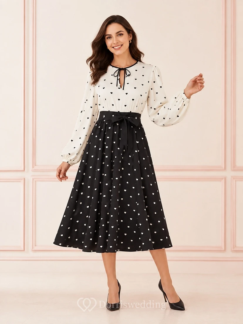 Teelanges, schlichtes schwarzes A-Linien-Kleid mit Schleife am Hals und Blumenmuster
