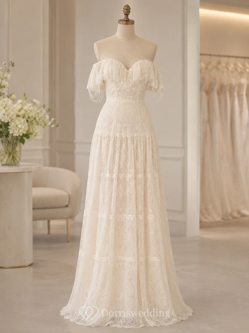 Vestido de novia bohemio de talla grande con hombros descubiertos, volantes y encaje con flecos view 7