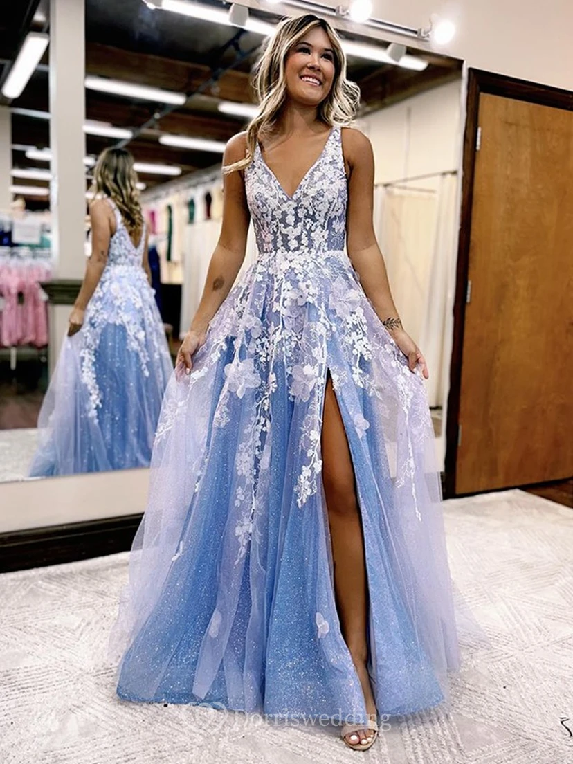 Elegante vestido de fiesta sin mangas con escote en V, corte en A y abertura frontal, con encaje, apliques y lentejuelas.