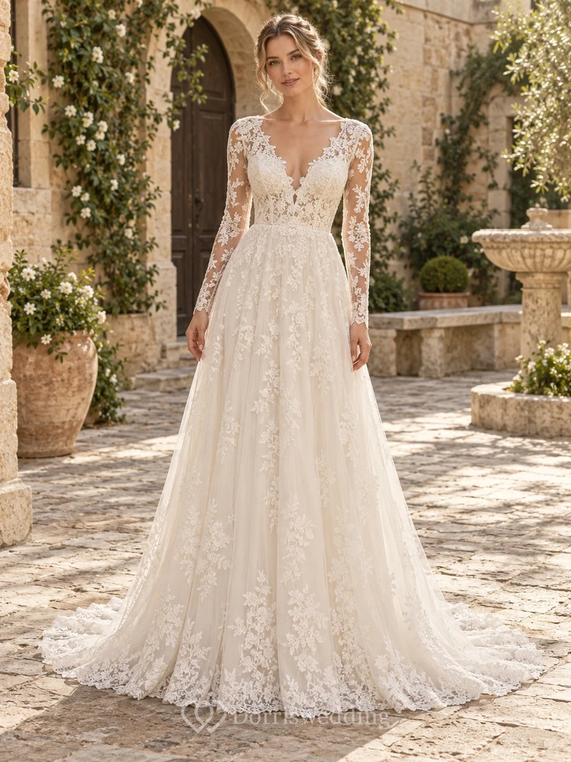 Robe de mariée en tulle à manches longues, décolleté en V profond et application florale, traîne, manches longues et décolleté en V profond.