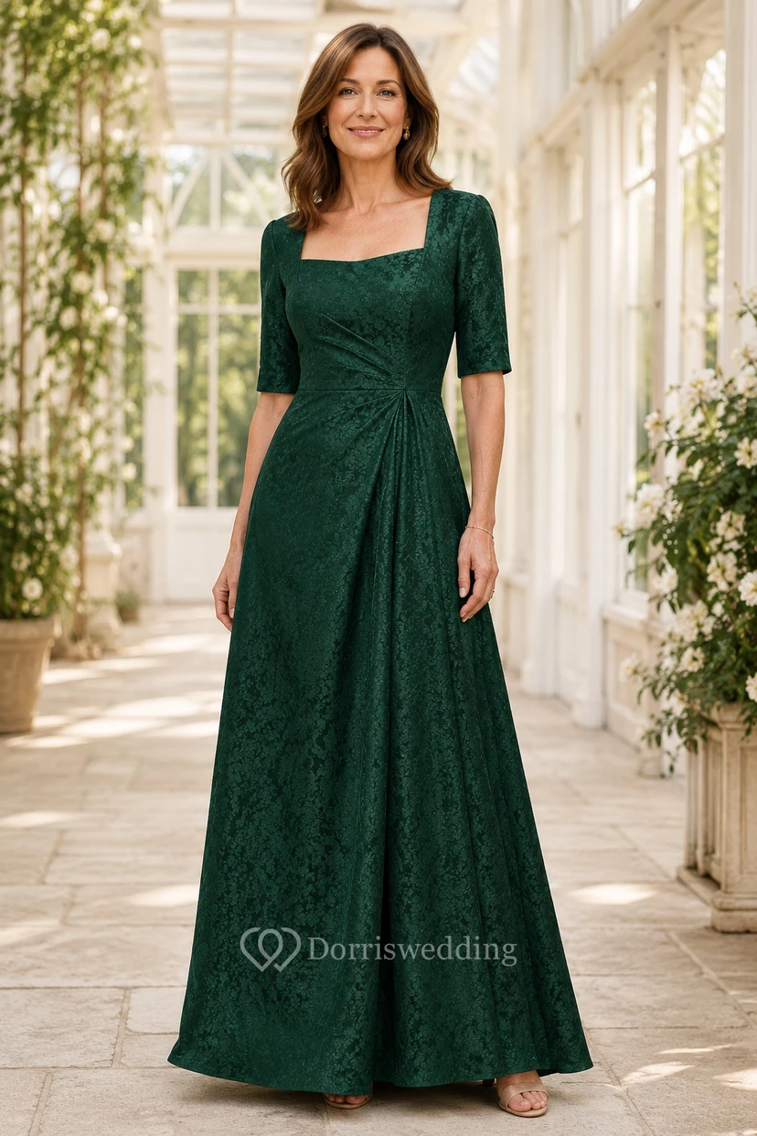 Dunkelgrünes, eckiges Spitzenkleid in A-Linie mit halblangen Ärmeln
