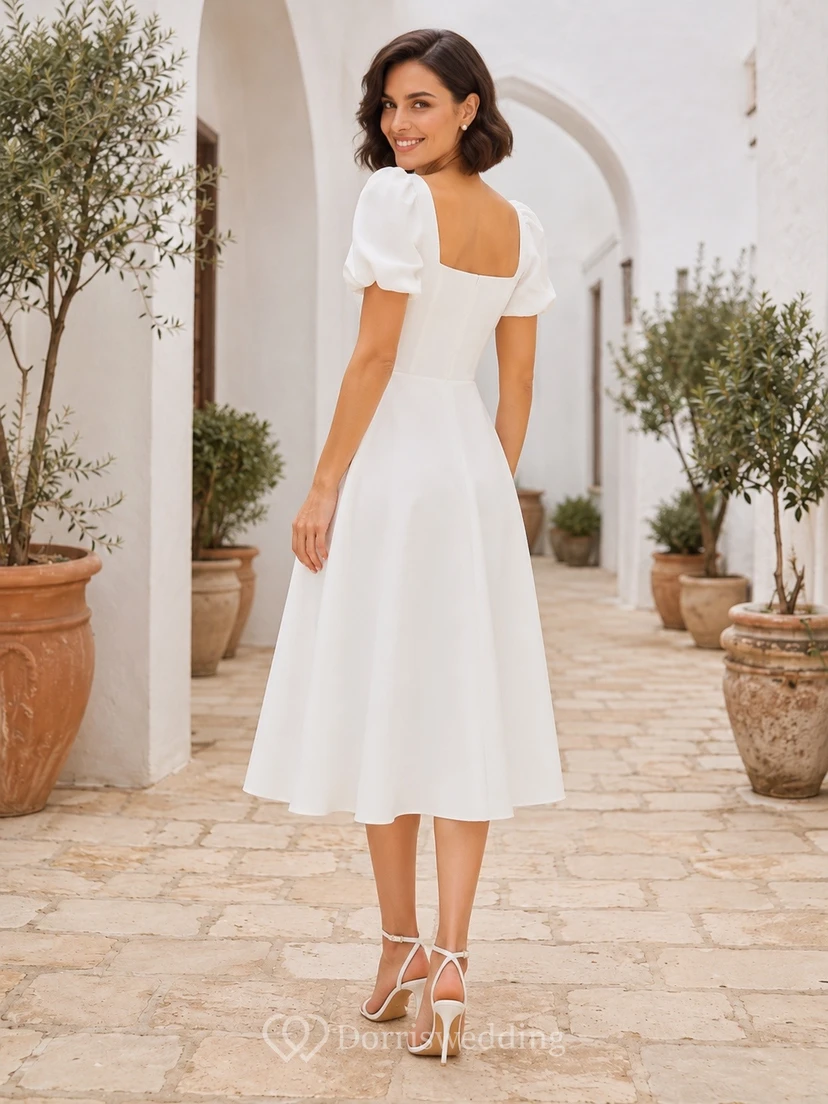 Vestido de novia sencillo de corte A con escote cuadrado y mangas abullonadas. view 2