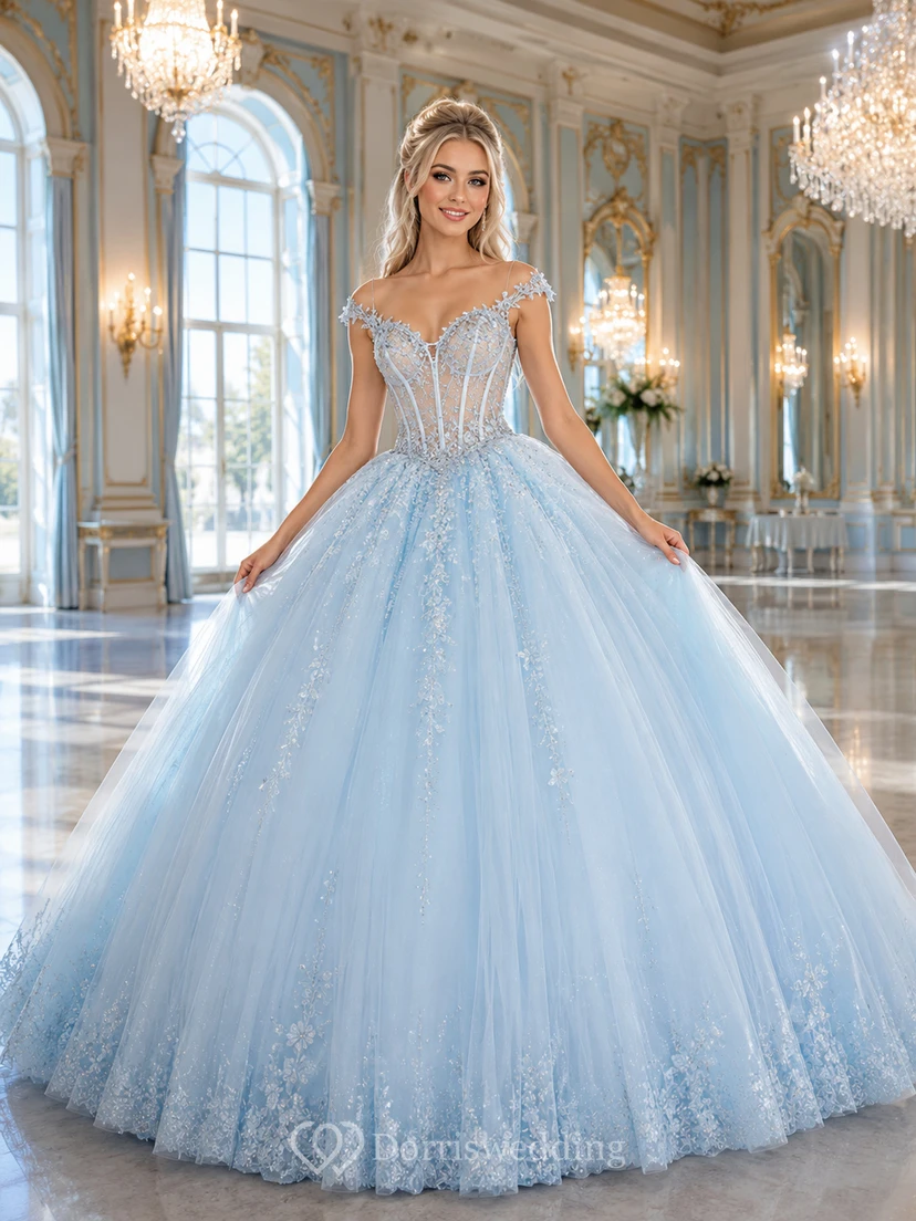 Vestido de quinceañera azul cielo con apliques de tul y escote corazón