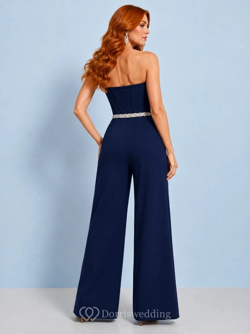 Marineblauer, taillierter Jumpsuit für festliche Anlässe mit trägerlosem Korsett-Oberteil, weitem Bein, Kristallgürtel und bodenlanger Passform