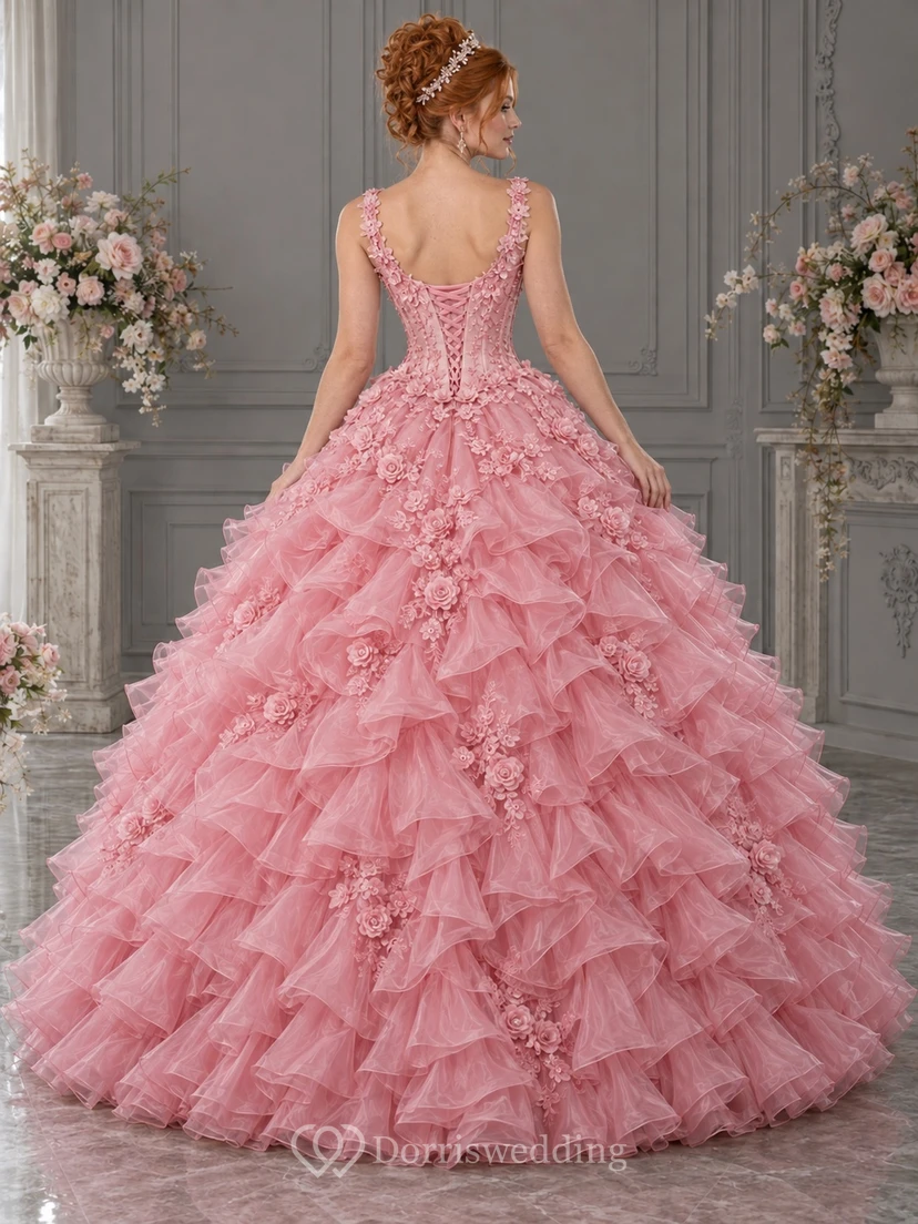 Vestido de novia de gala color rosa empolvado con escote redondo y tirantes florales, adornado con cascadas de organza cubiertas de rosas. view 2