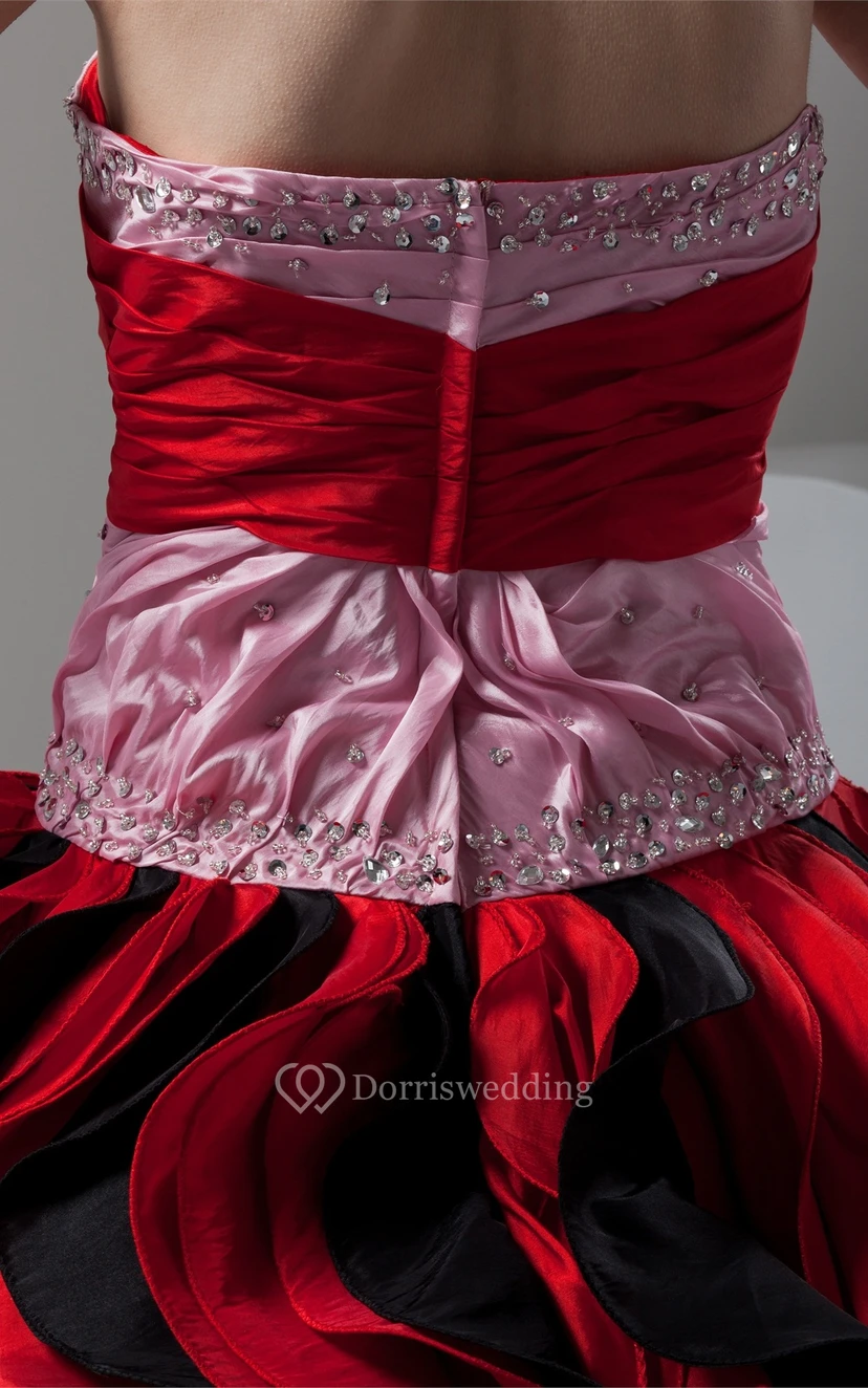 Mute-Color Ruffled Stress and Ball-Gown With Broach view 2