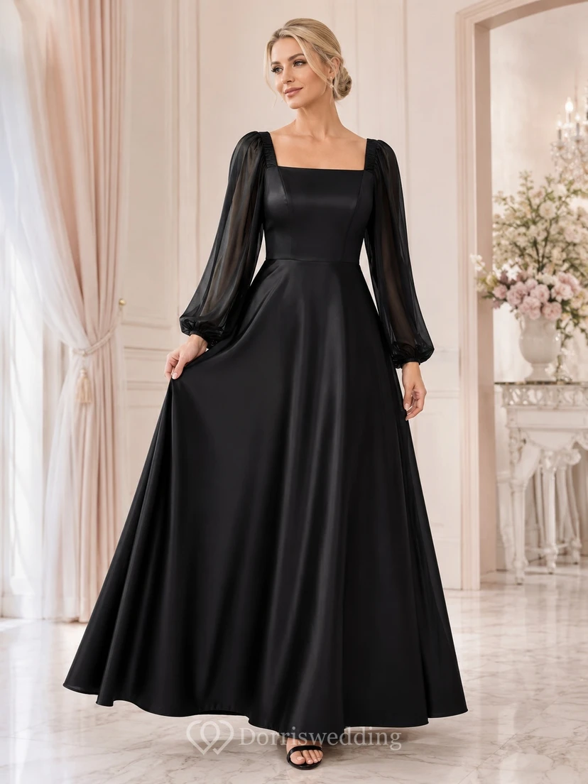 Robe longue noire sobre en satin, manches longues bouffantes, col carré et coupe trapèze.