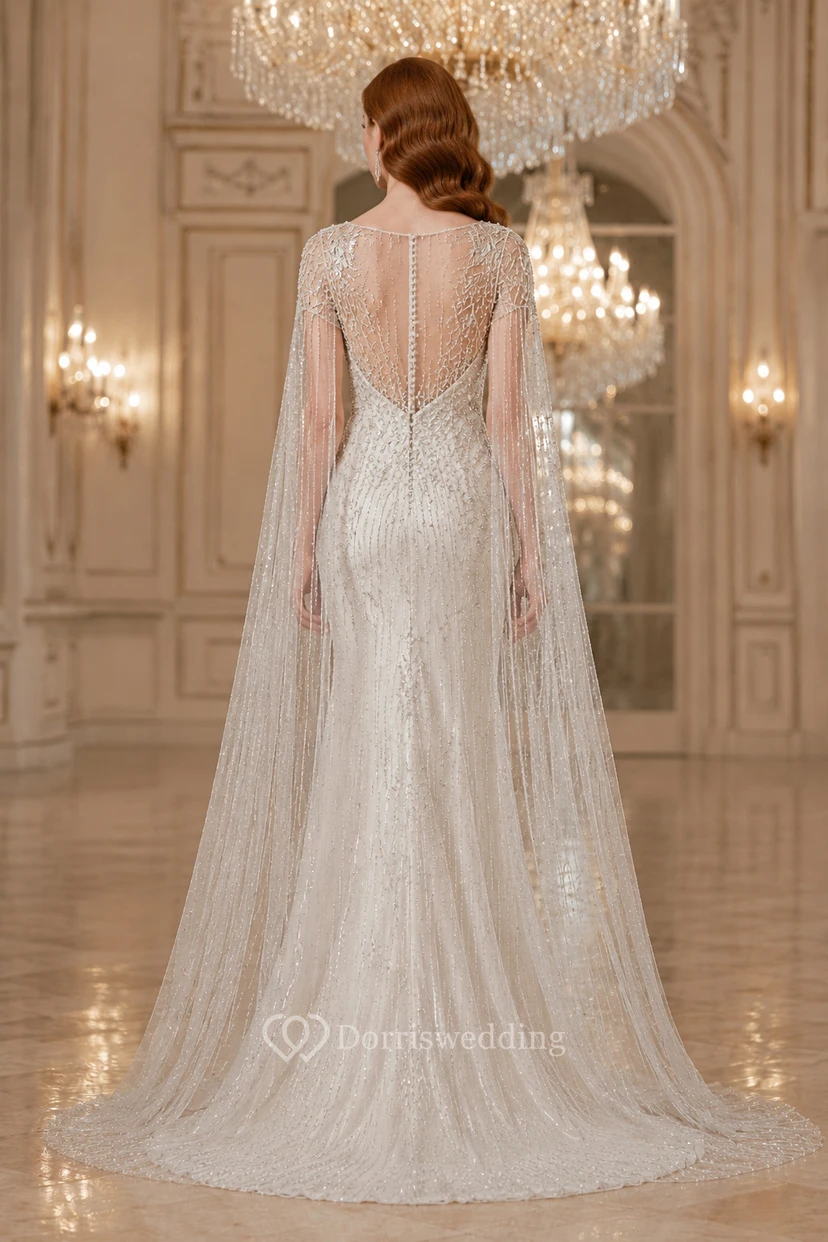 Robe de mariée fourreau en dentelle perlée à manches longues avec traîne cape view 2