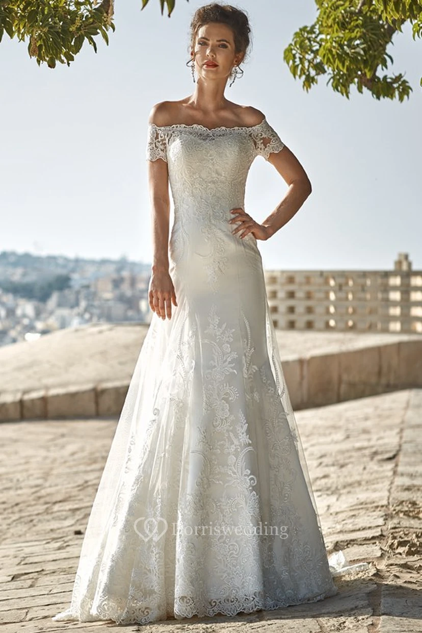 Vestidos de novia de encaje con apliques y escote Bardot, largos hasta el suelo. view 3